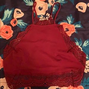 Burgundy cami crop top, never worn size large.